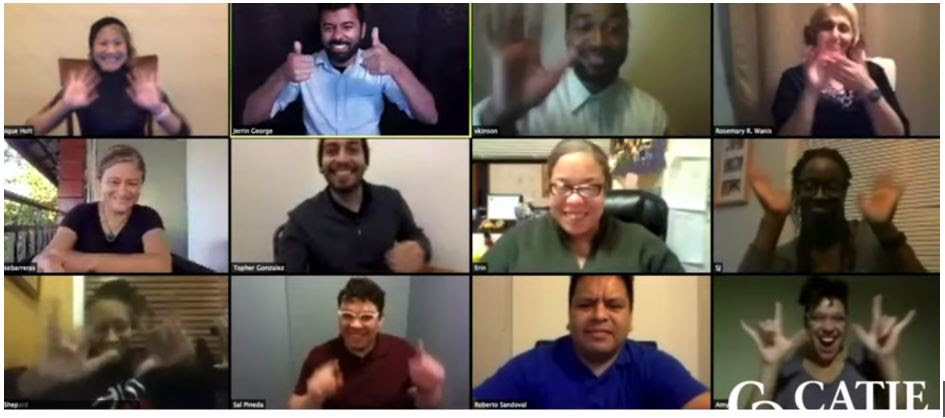 Screen shot of Zoom meeting with 12 deaf people of color waving at the screen in farewell
